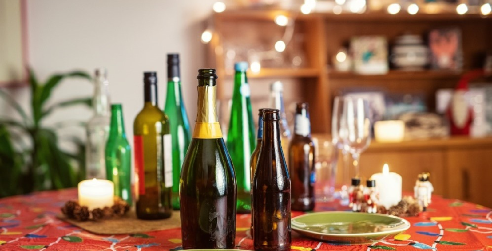 empty bottles on table - illustrating recycling & waste collection arrangements over Christmas