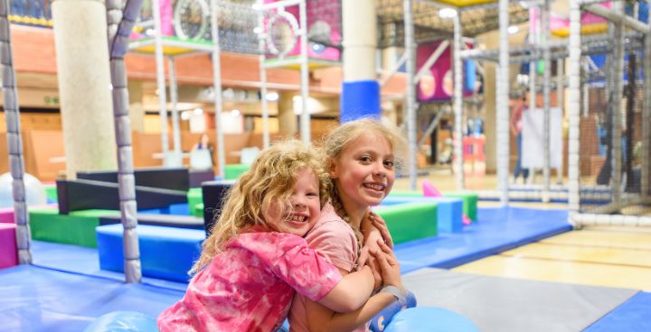 Two girls play in soft play at Lambeth Leisure Centres