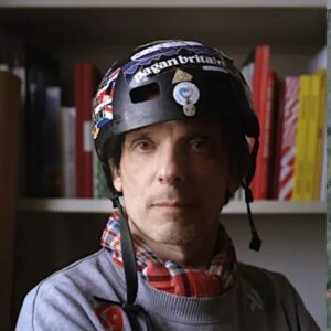 artist Jeremy Deller in helmet