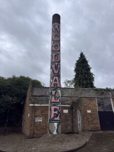 Mural painted on a free standing chimney in Woodvale estate