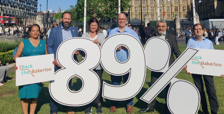 Leaders of South East London Council's holding placards in front of Parliament