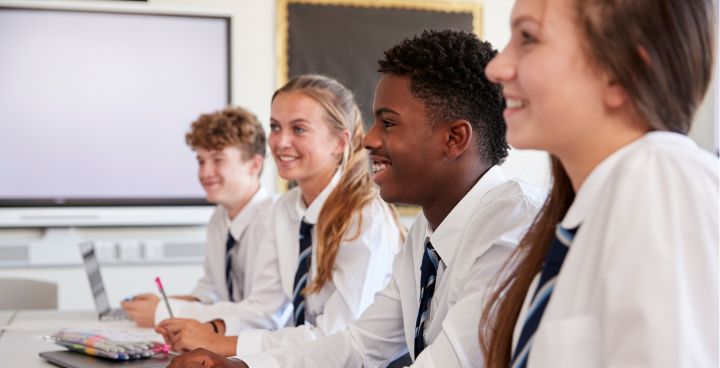 Secondary school pupils in classroom