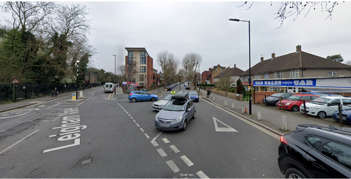 Palace Road Junction, busy with cars