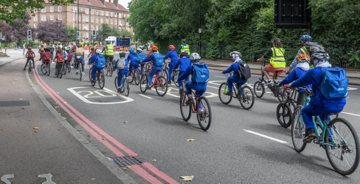 Pupils riding in a 'bike bus' through Lambeth